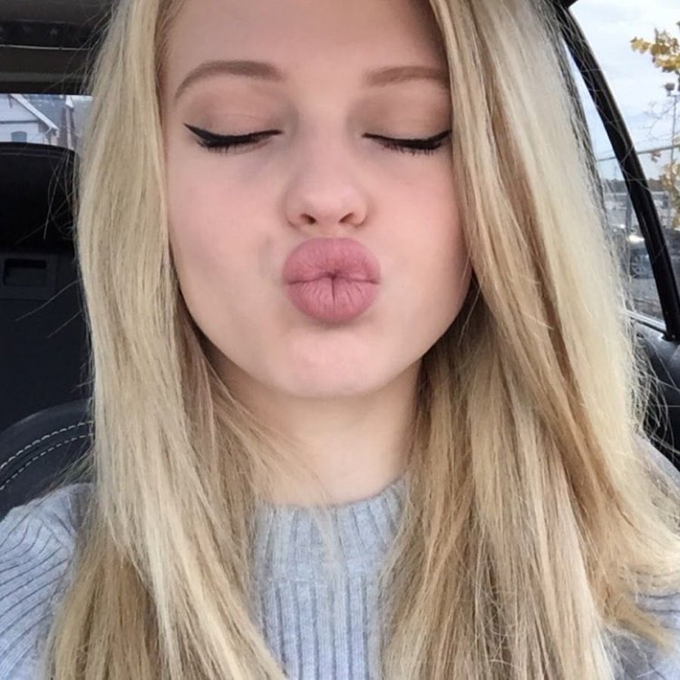 Beautiful girl with plump lips