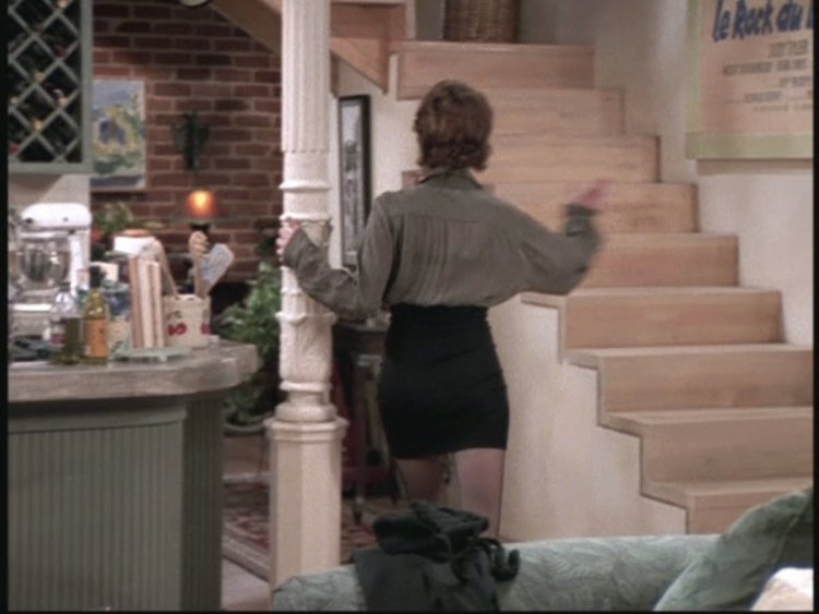 Leah Thompson in a skirt