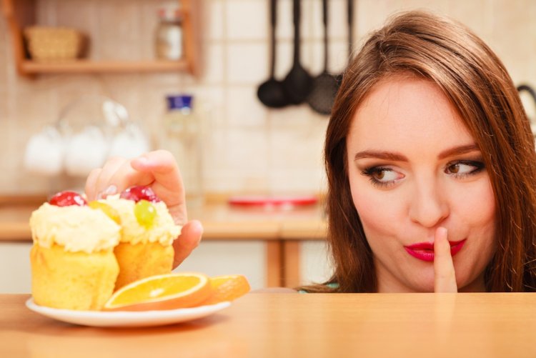 Girl eating a piece of cake