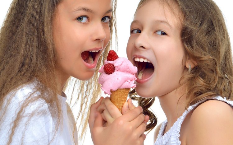 Girl licking ice cream