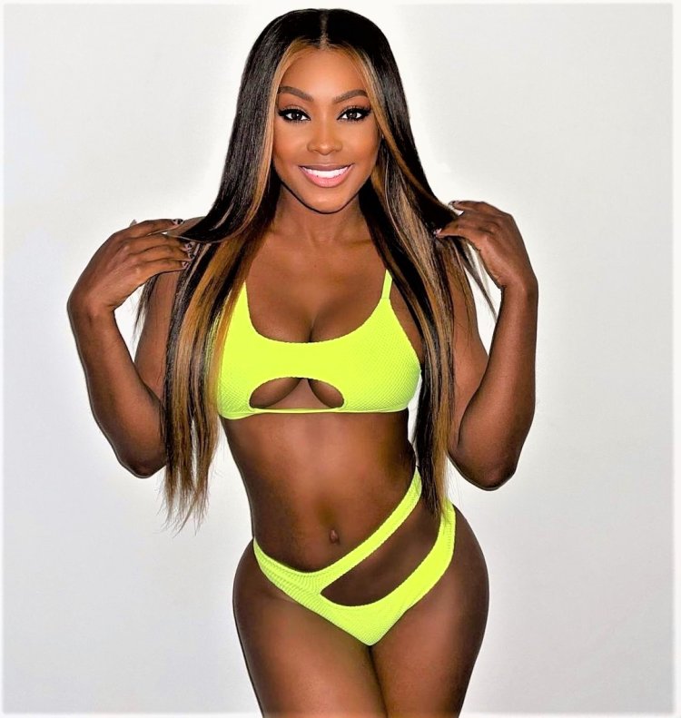 Big black ebony in swimsuit