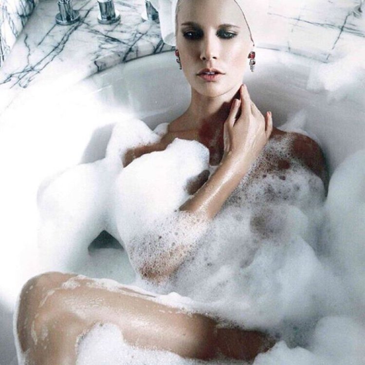 Lena flying in a bathing suit