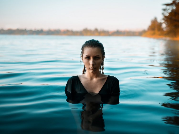 Girl up to her waist in water
