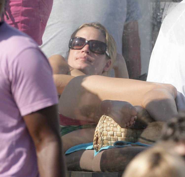 Ashley Scott Bikini squatted