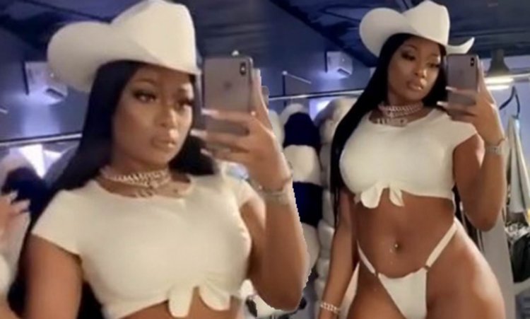 Megan Thee Stallion in a white hat
