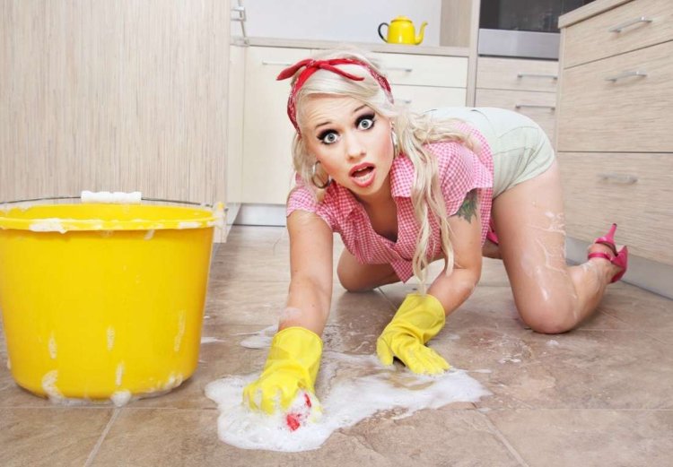 Girl cleaning the floor