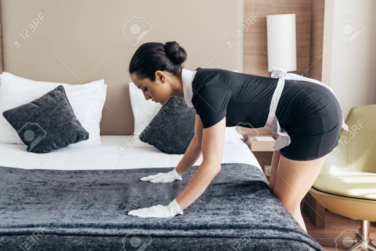 Maid making the bed
