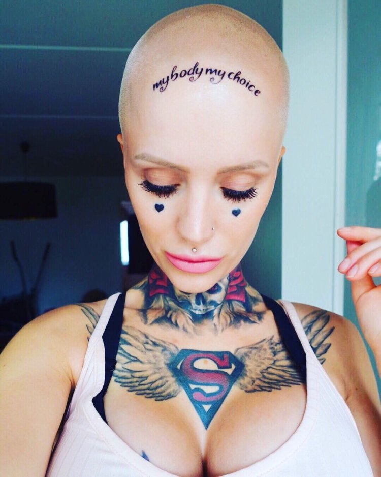 Bald girls with tattoos