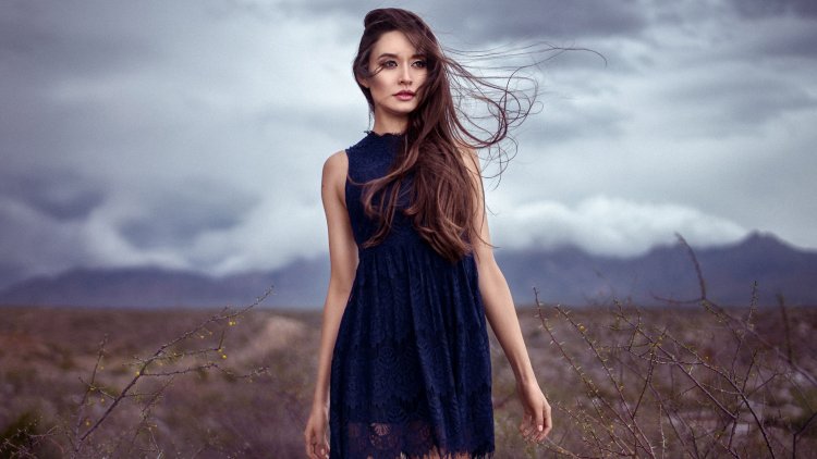 Girl in a dress in the wind