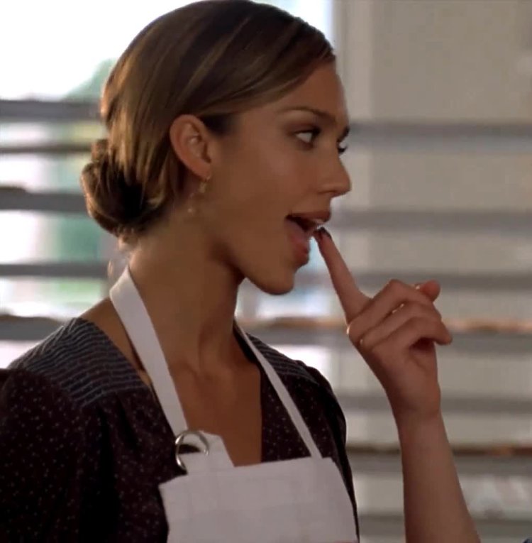 Jessica Alba licks her finger
