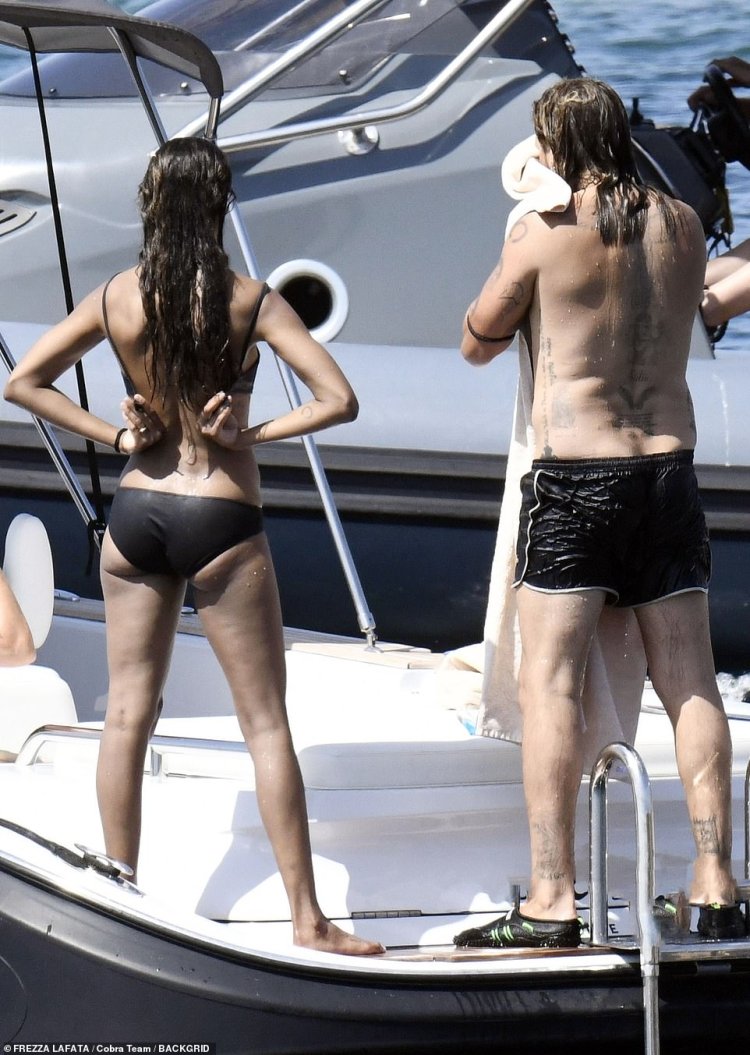 Zoe Saldana draining on a yacht