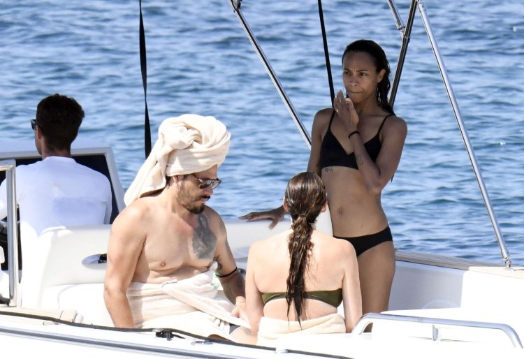 Zoe Saldana photo on a yacht without a bra