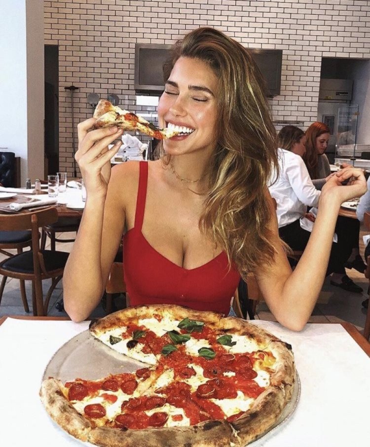 Pretty girl with pizza