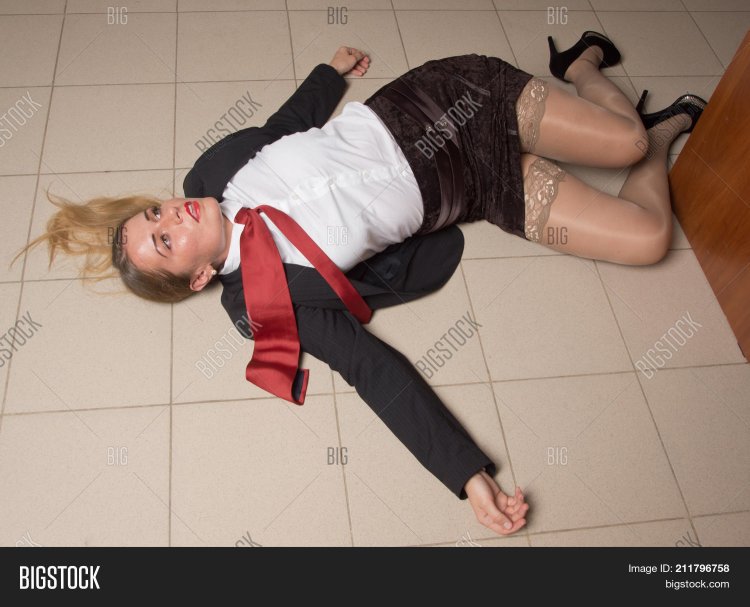 Crime Scene with strangled pretty Business woman in Office