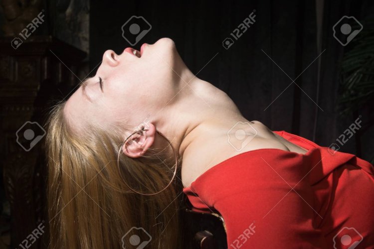 Woman with head thrown back