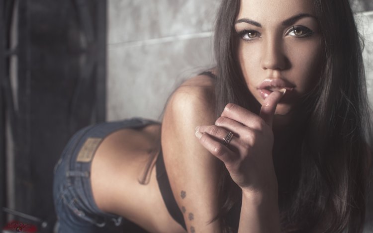 Girl beckoning with her finger