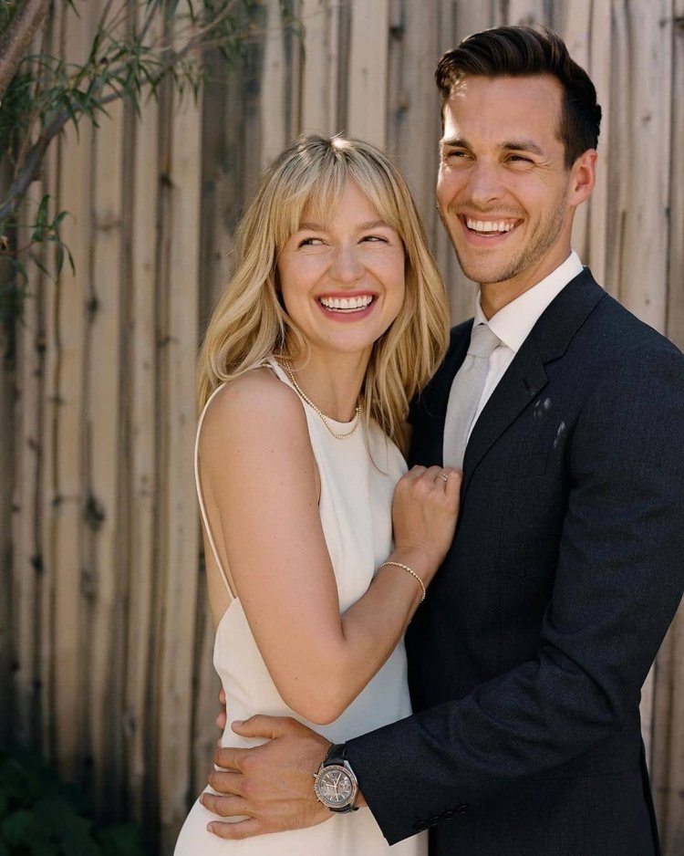 Melissa Benoist and Chris Wood