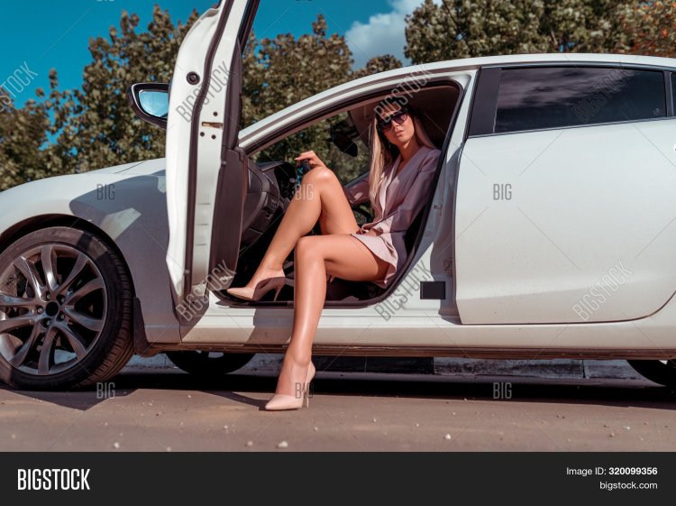 The girl stretched out of the car