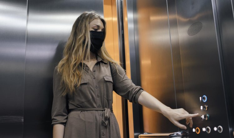 Woman in the elevator