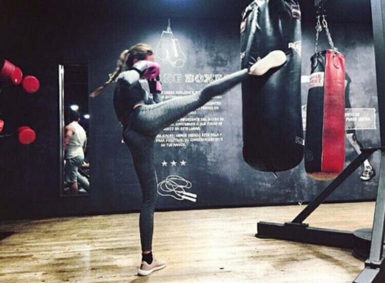 Boxing girl from the back