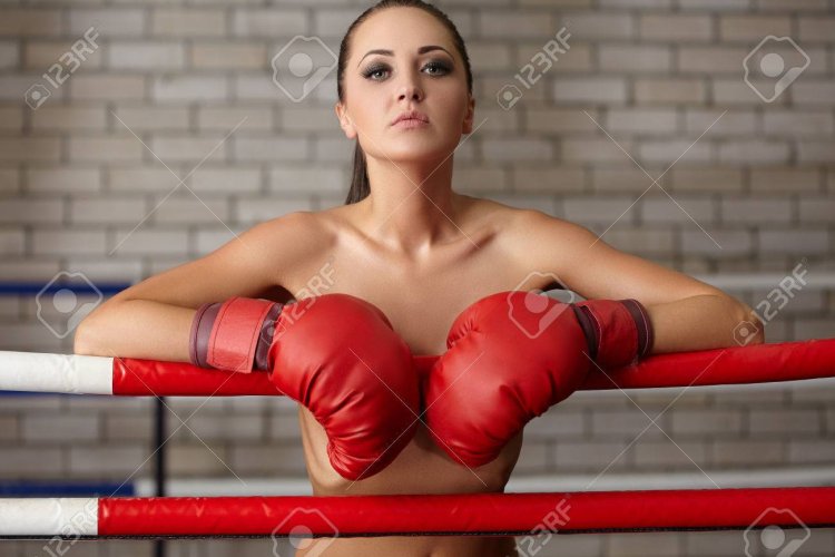 Girls in boxing gloves in the ring