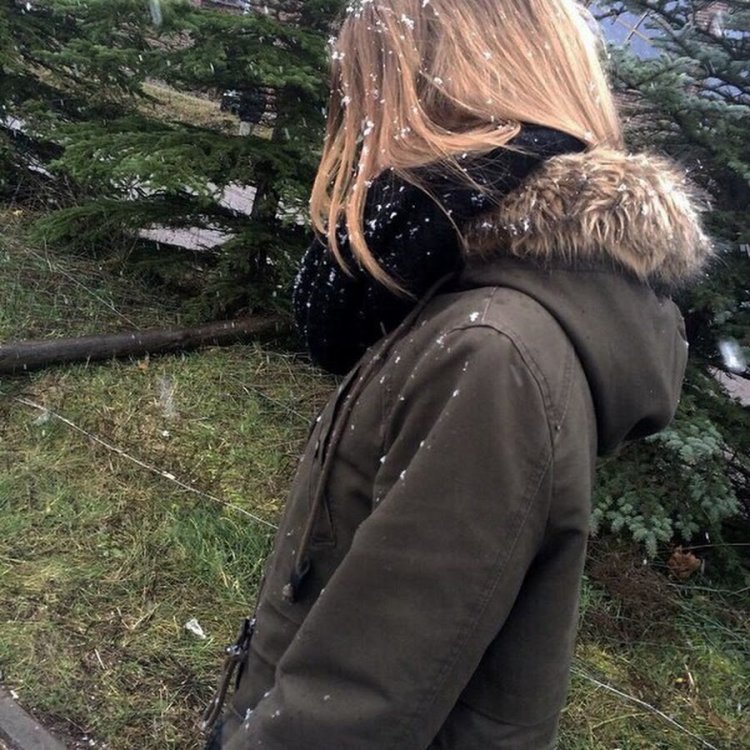 Blonde in a jacket from the back