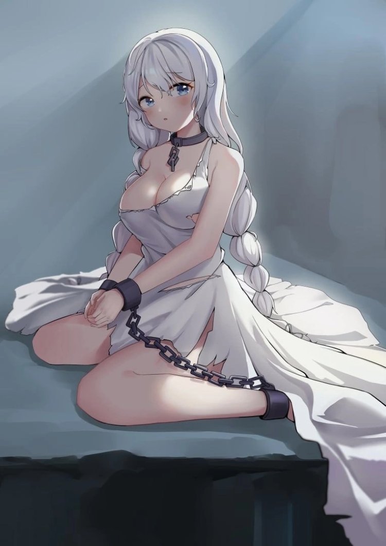 The girl is tied to the bed