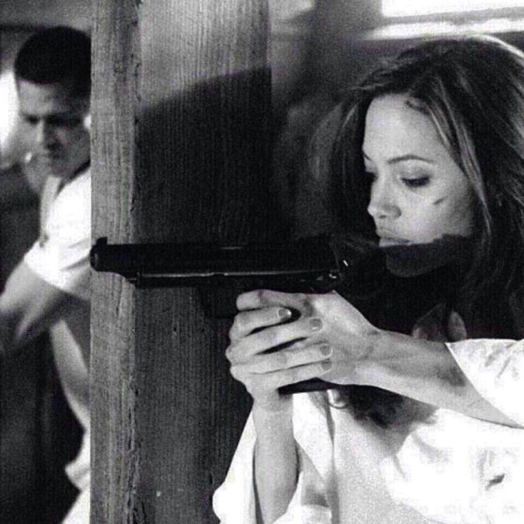 Angelina Jolie with a gun