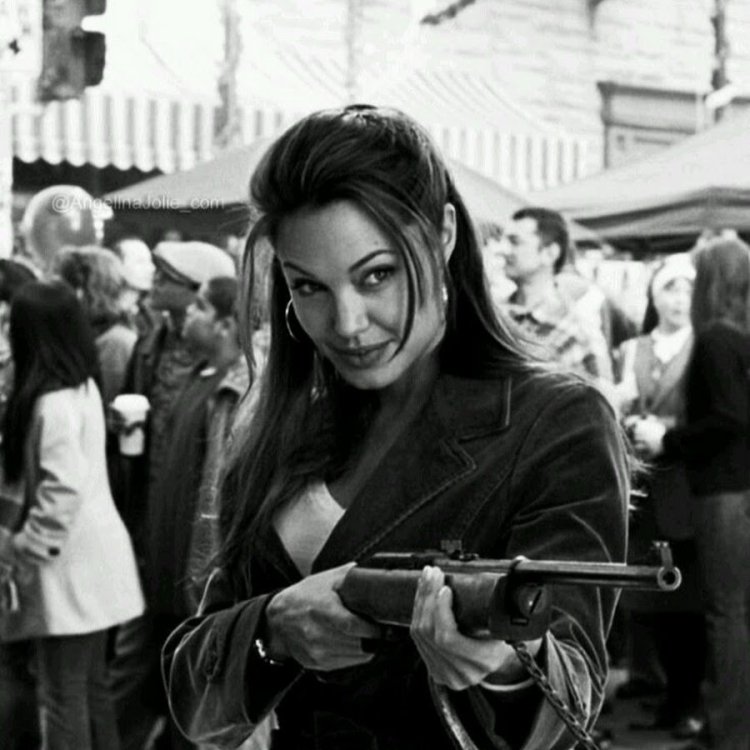 Angelina Jolie with a gun