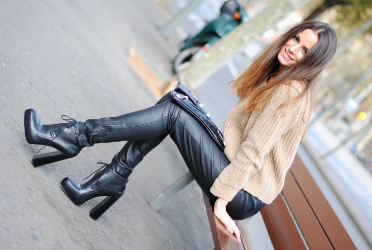Girl in heeled ankle boots