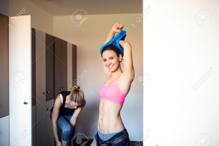 Girls changing clothes in the fitness center