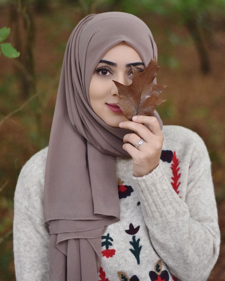 Girl smile on her face in a veil in a hijab