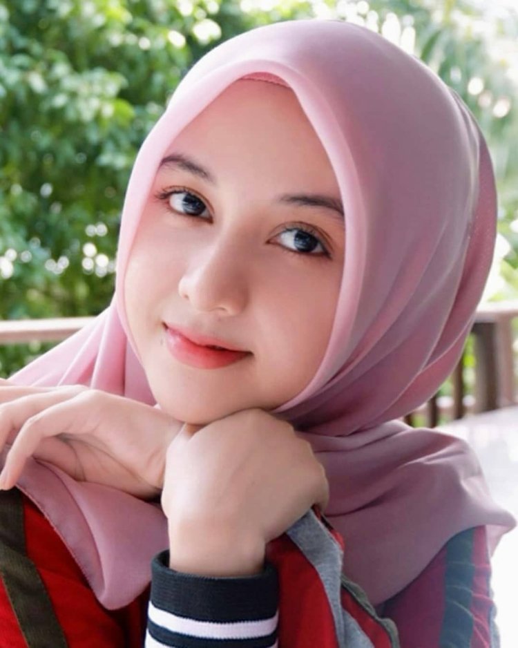 Girl in Hijab with Green Eyes