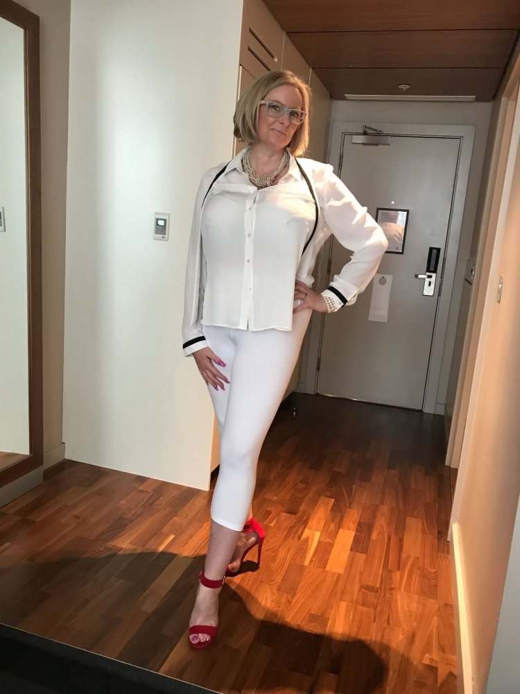 White leggings mature blonde