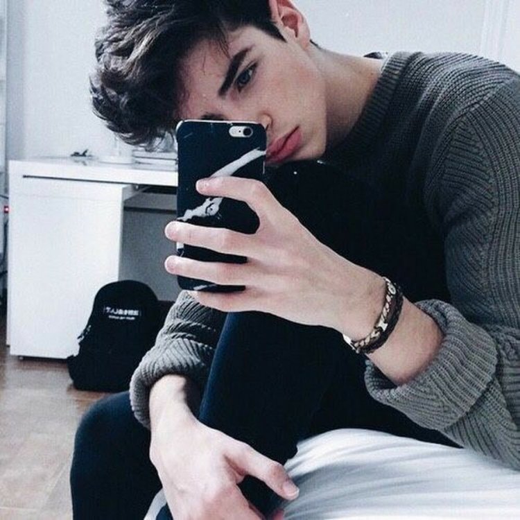 Manu Rios in the mirror