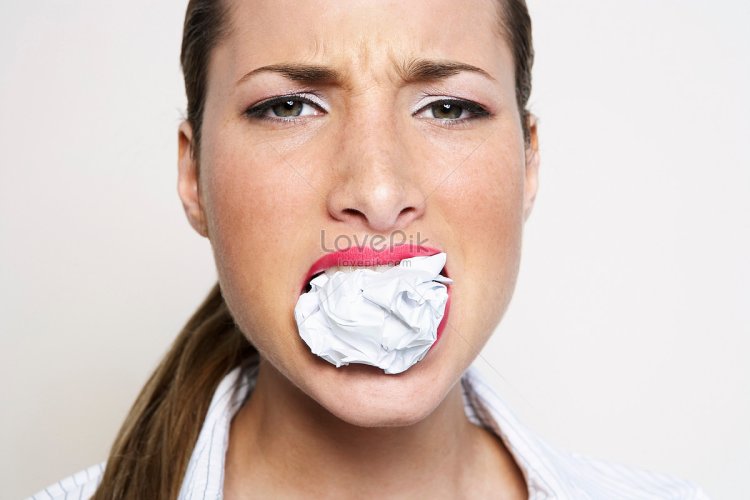 Women with a rag in the mouth