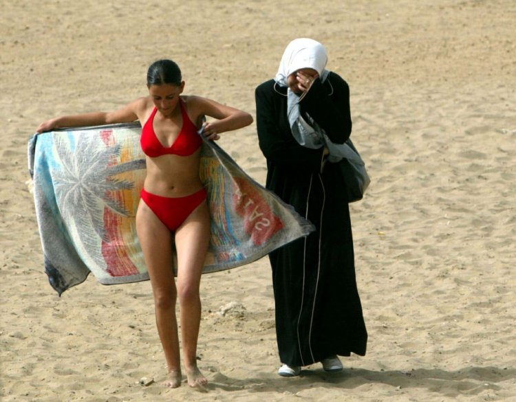 Muslims on the beach in a swimsuit