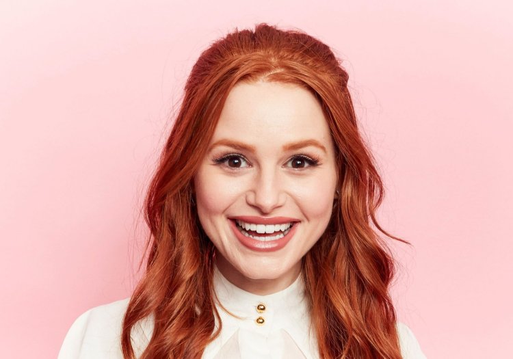 Madelin Petsh in a red dress