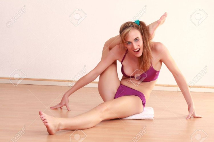 Mulatto with Legs Behind the Head