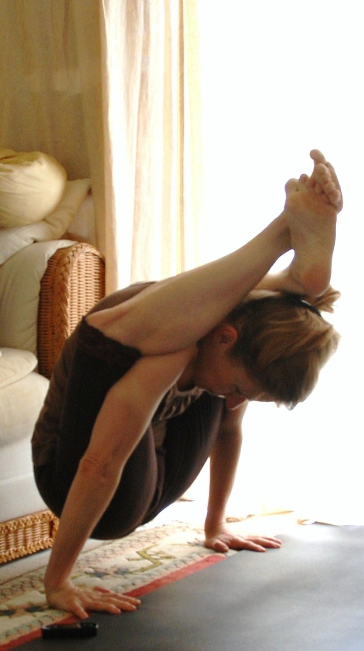 Yoga head between legs