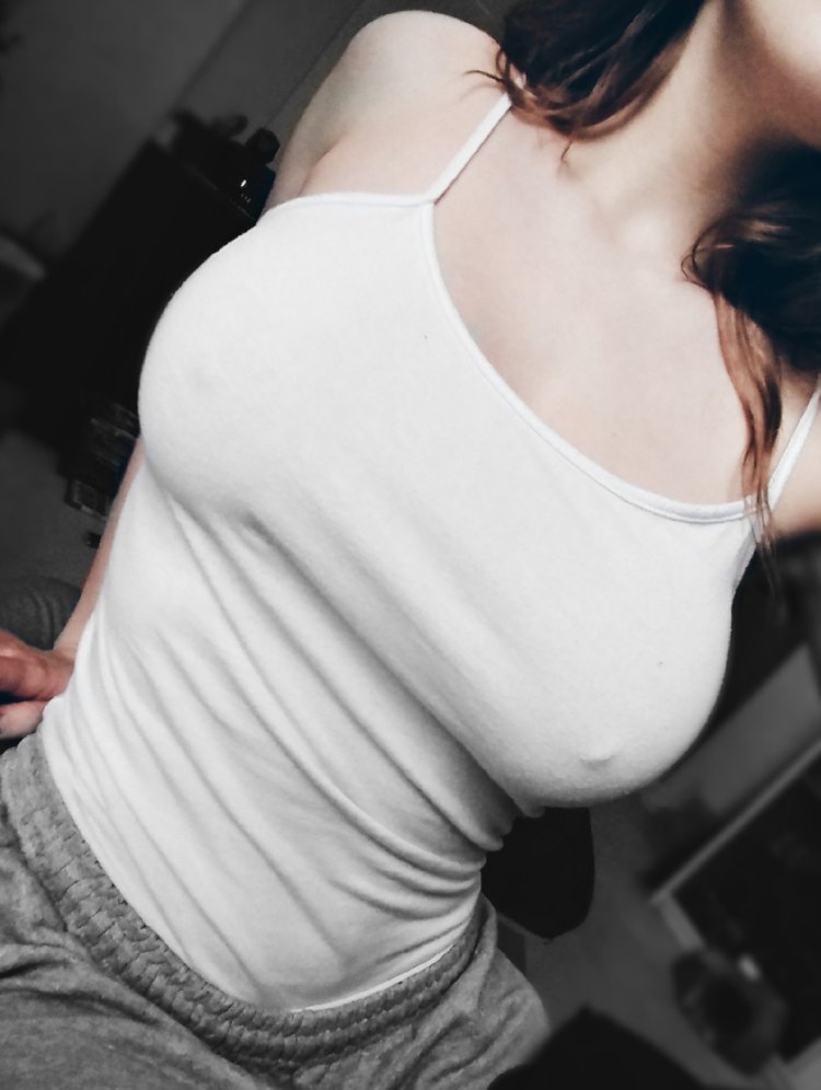 Girl beautiful breasts in a T -shirt sucked