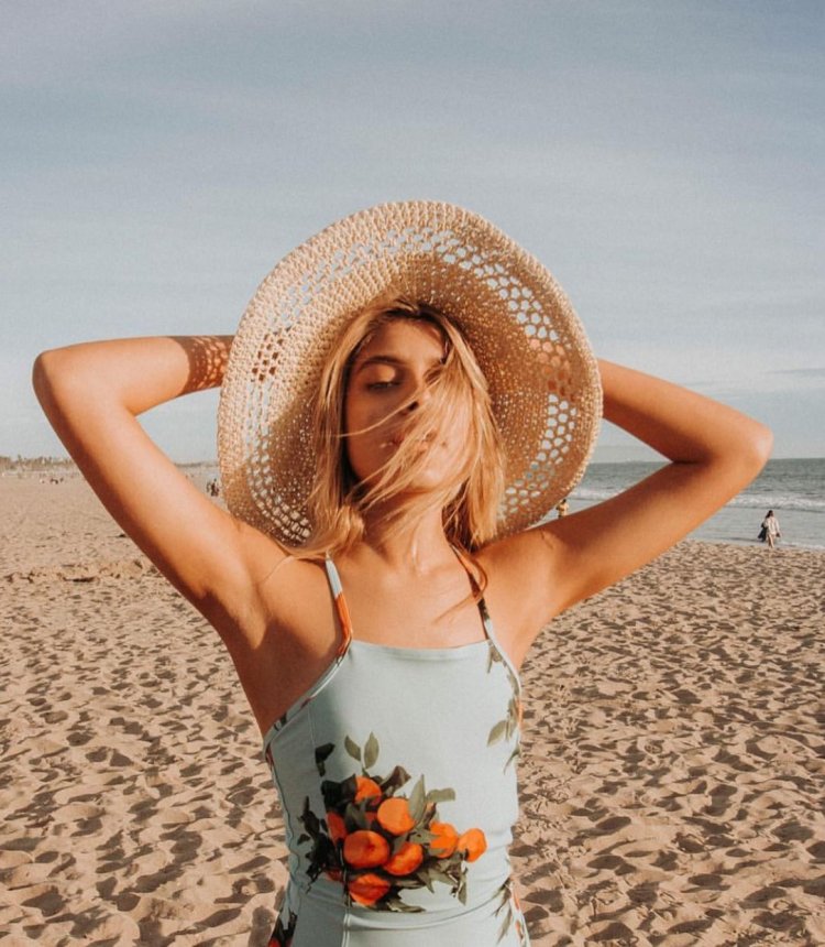 Hot chicks in the bikini by the pool