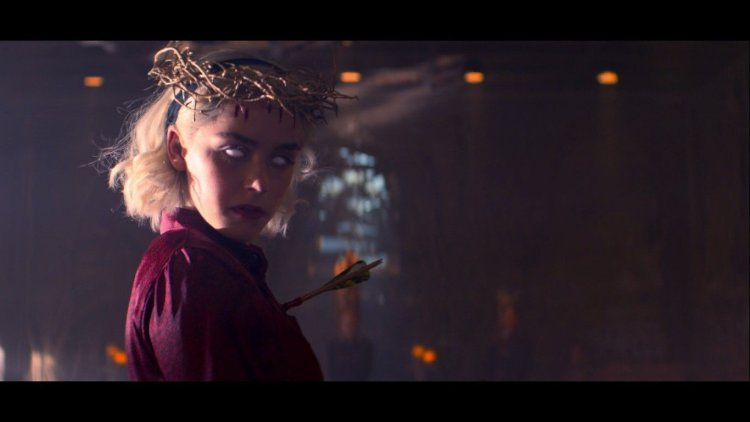 Sabrina Spellman with white eyes and wreath