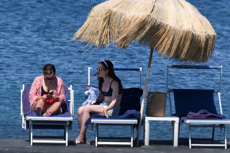 Out for a Swim in the Hotel Pool in ISCHIA, Italy Lily Collins