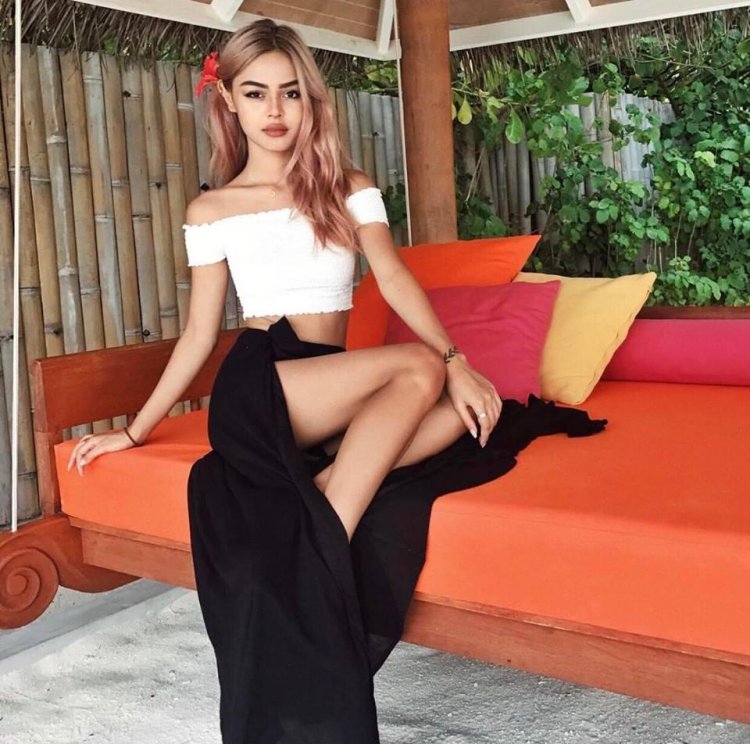 Lily Maymac in a red dress