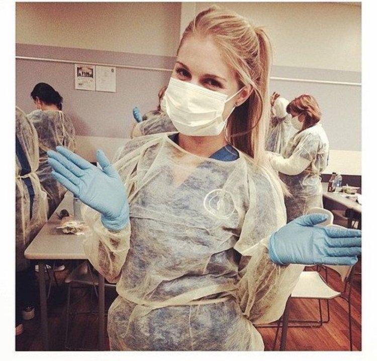 Girl in medical gloves