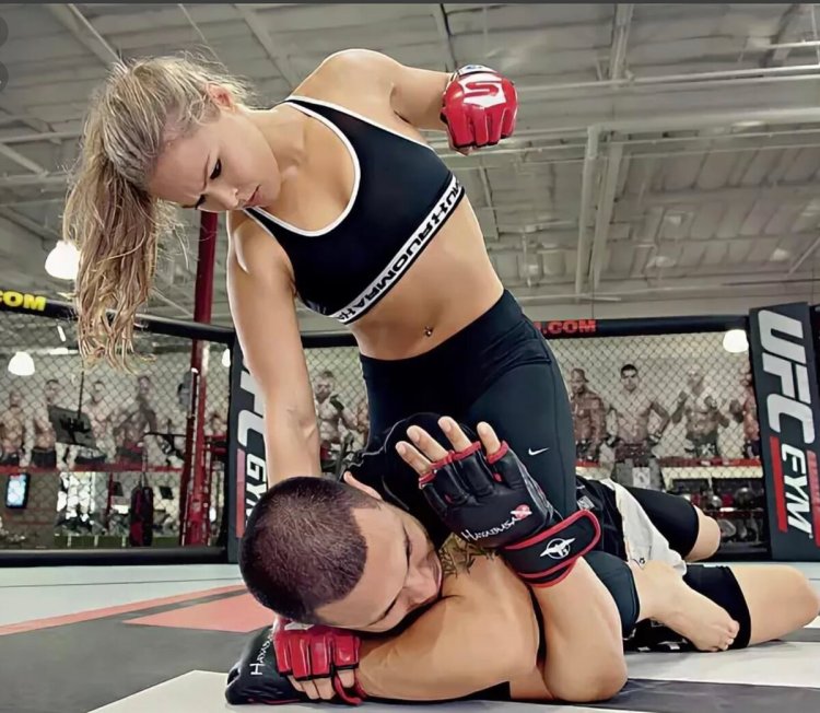 Boxing girl against a guy