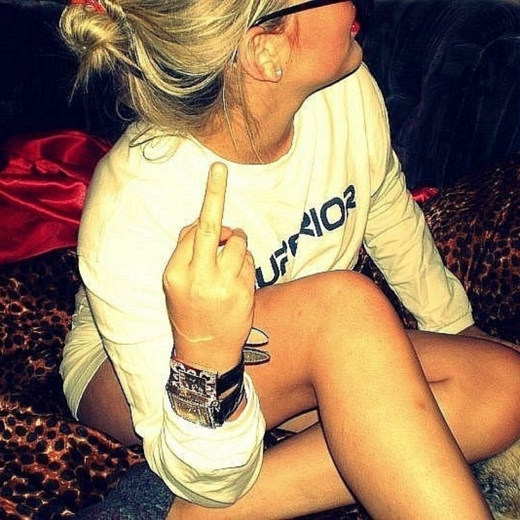 Blonde shows the middle finger without a face