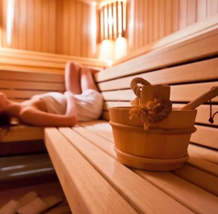 Women's legs in steam room