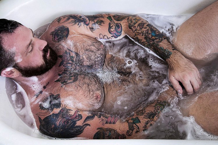 Naked hairy man in the bathroom